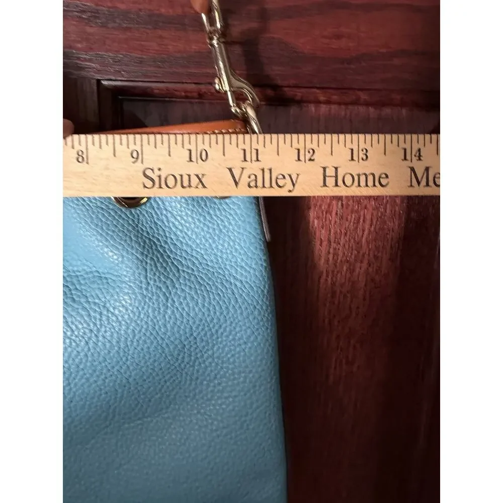 Dooney & Bourke Pebble Grain Drawstring Bucket Bag Blue Leather Red Interior